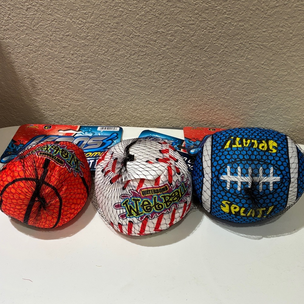 NWT 3 Water Sport Balls. Soak in water and throw